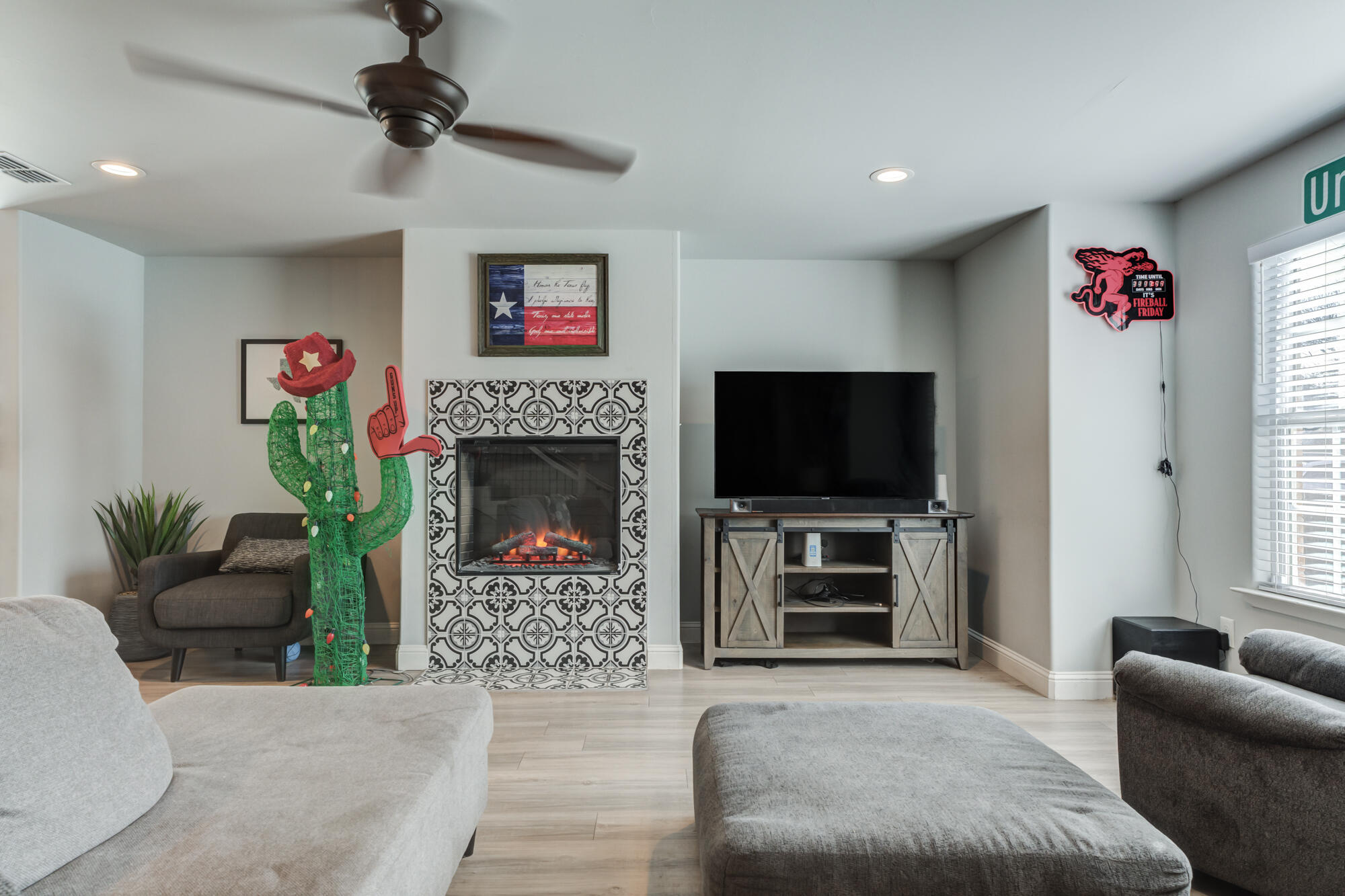 2414 25th Street Lubbock, TX 79411 - Photo 6 of 61 a living room with furniture and a flat screen tv