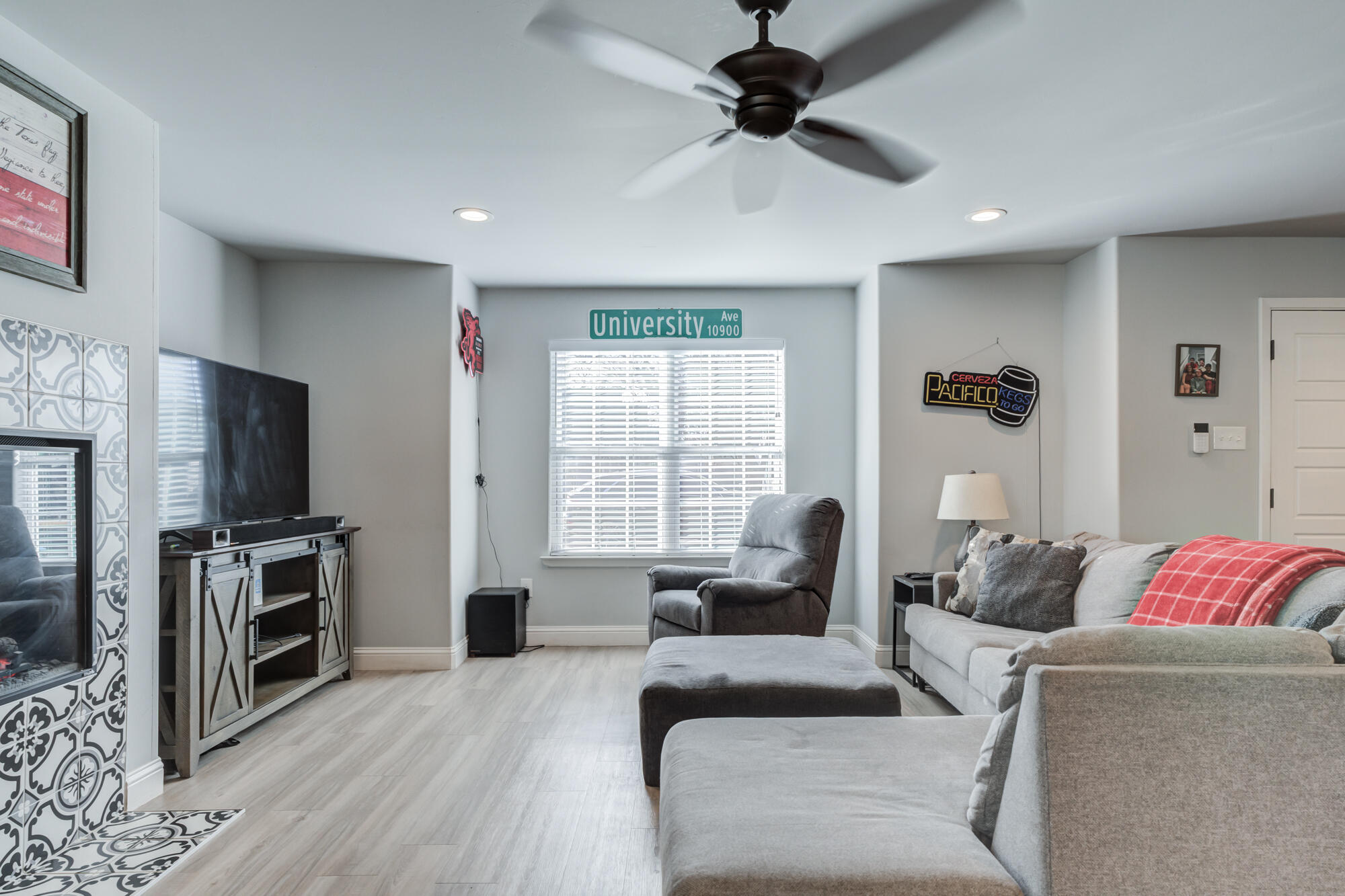 2414 25th Street Lubbock, TX 79411 - Photo 7 of 61 a living room with furniture and a flat screen tv