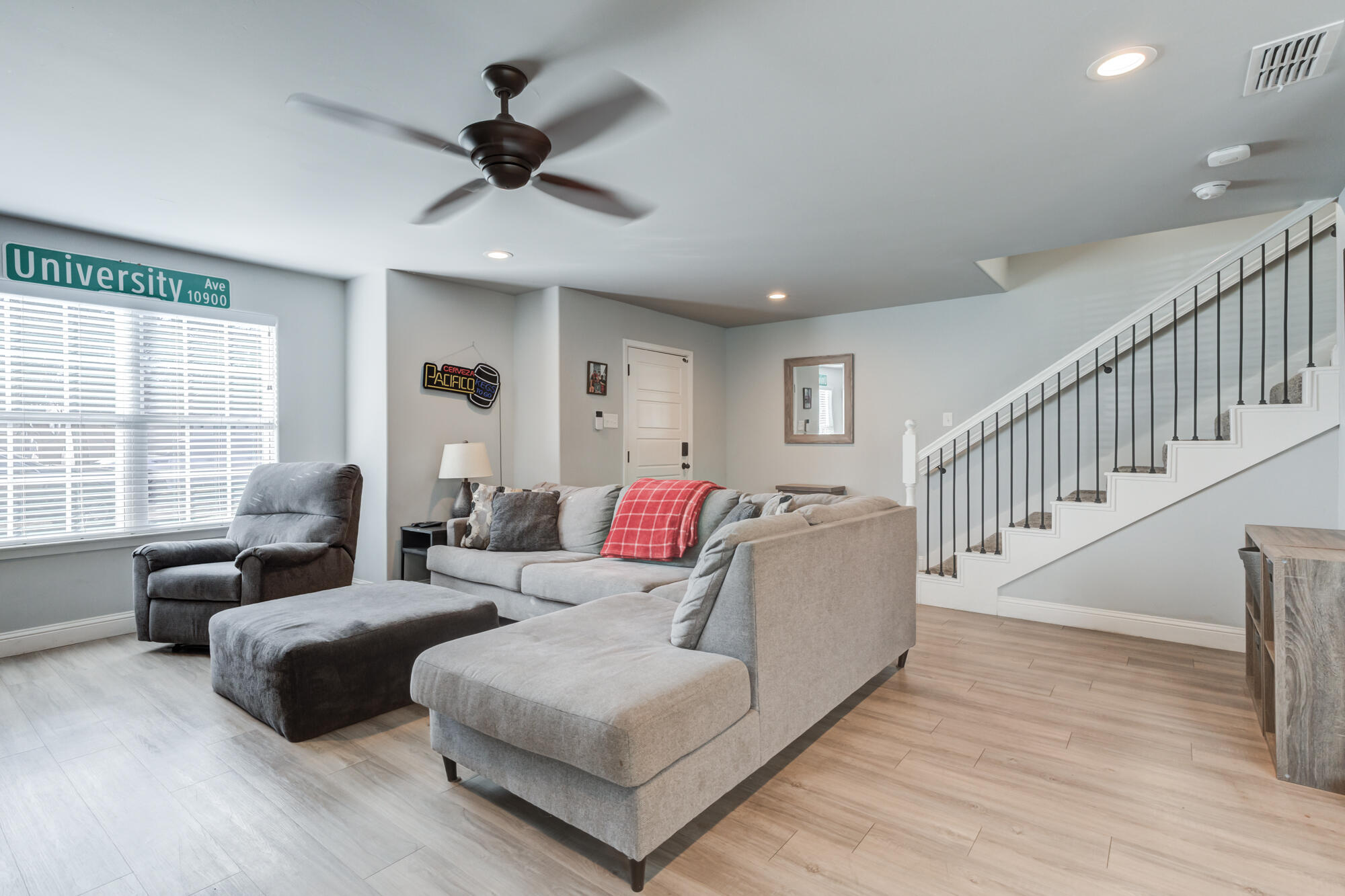 2414 25th Street Lubbock, TX 79411 - Photo 9 of 61 a living room with furniture and a large window