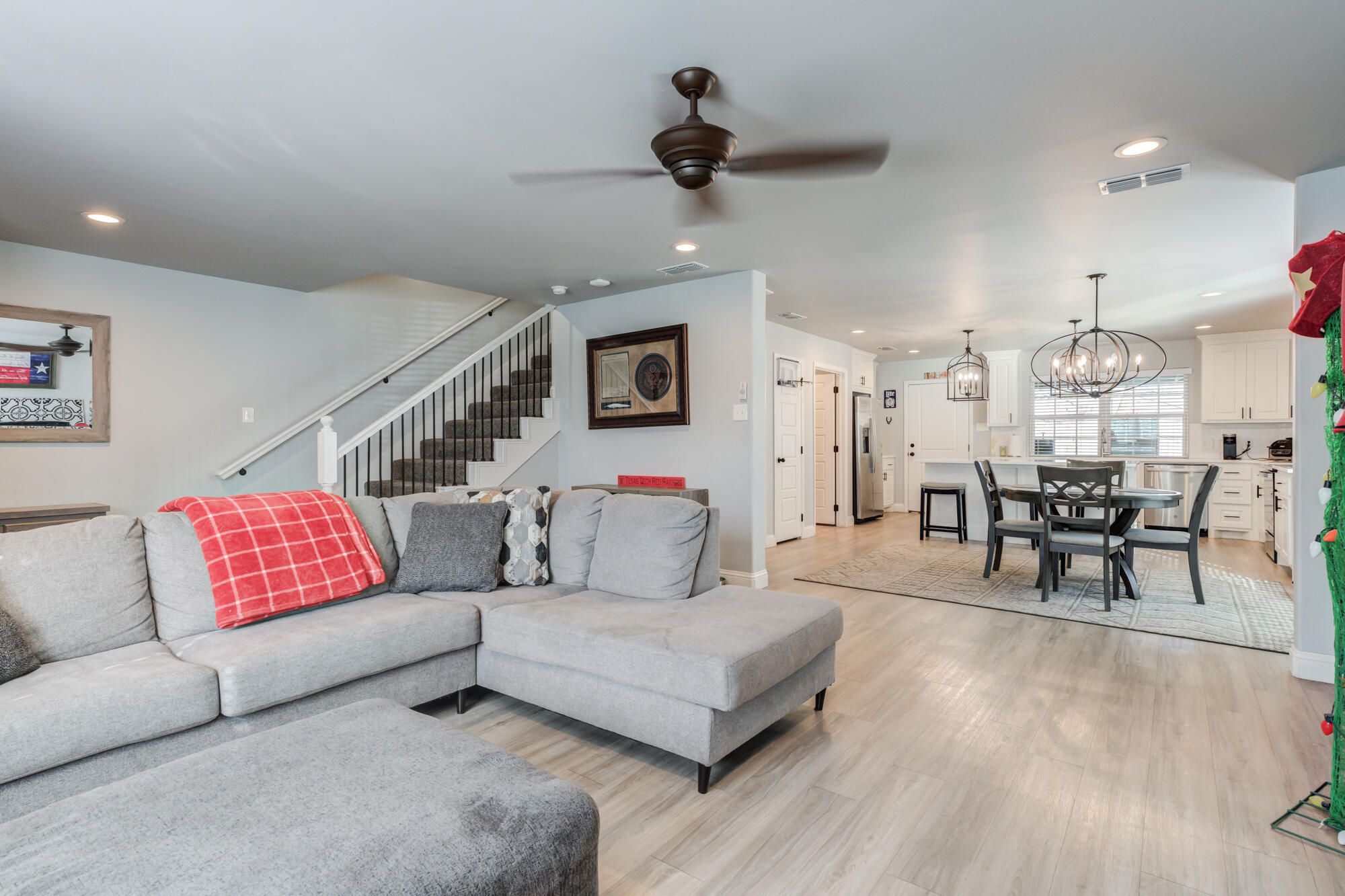 2414 25th Street Lubbock, TX 79411 - Photo 10 of 61 a living room with furniture and wooden floors