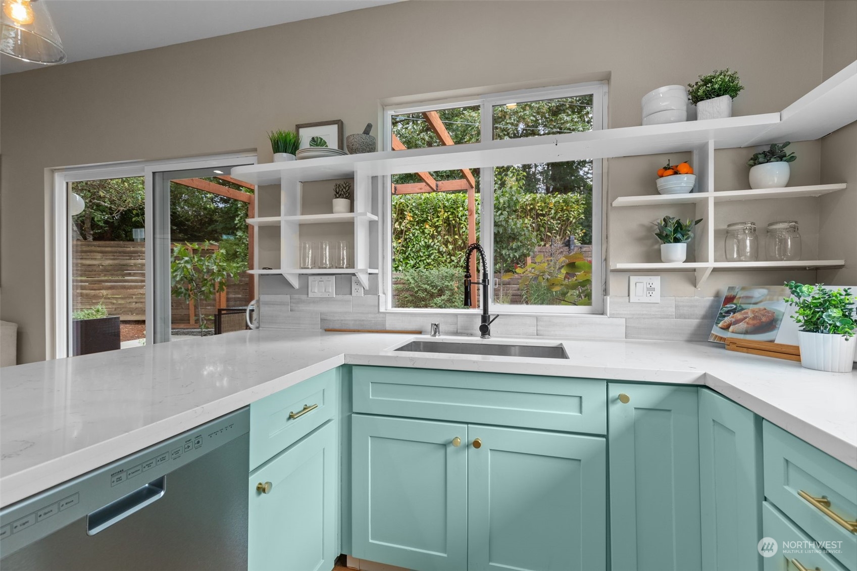 5503 Renton Avenue South Seattle, WA 98118 - Photo 11 of 39 a kitchen with cabinets a window and a sink