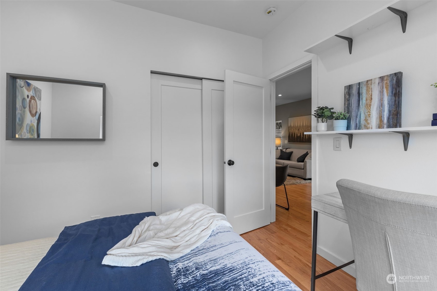 5503 Renton Avenue South Seattle, WA 98118 - Photo 15 of 39 a bedroom with a bed and a view of bathroom