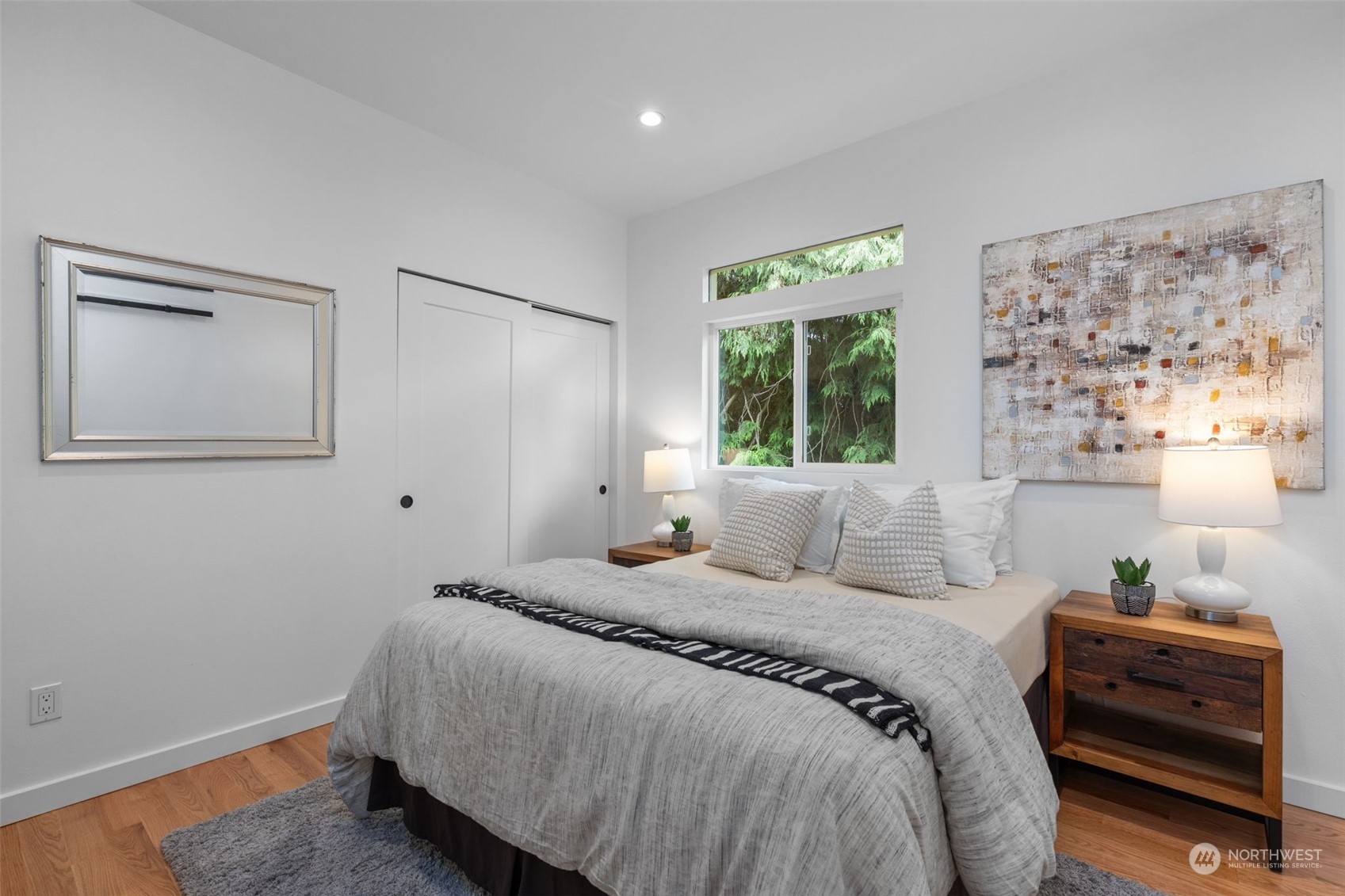 5503 Renton Avenue South Seattle, WA 98118 - Photo 17 of 39 a bedroom with a bed and a window