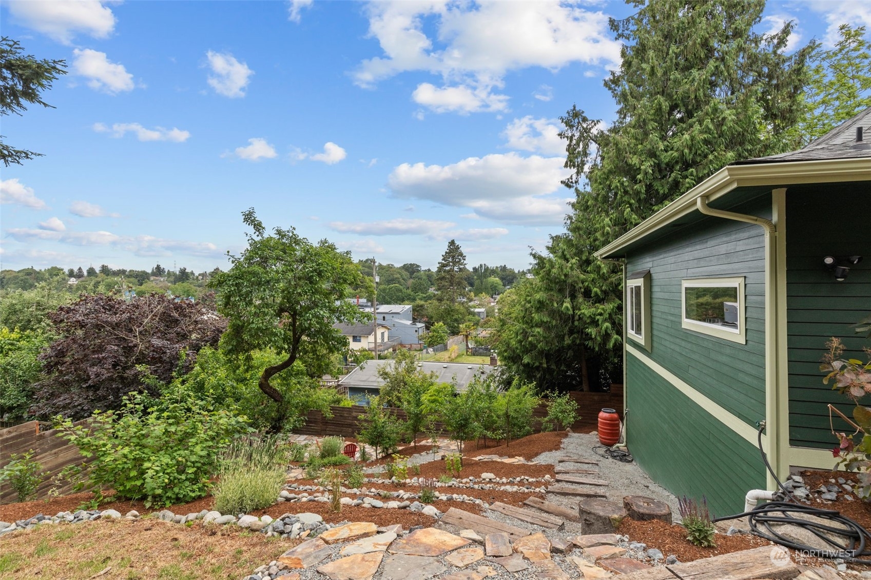 5503 Renton Avenue South Seattle, WA 98118 - Photo 28 of 39 a backyard of a house with lots of green space