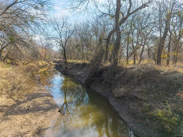 a view of a lake with a mountain in the background