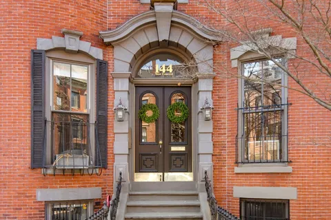 a front view of a house with a window