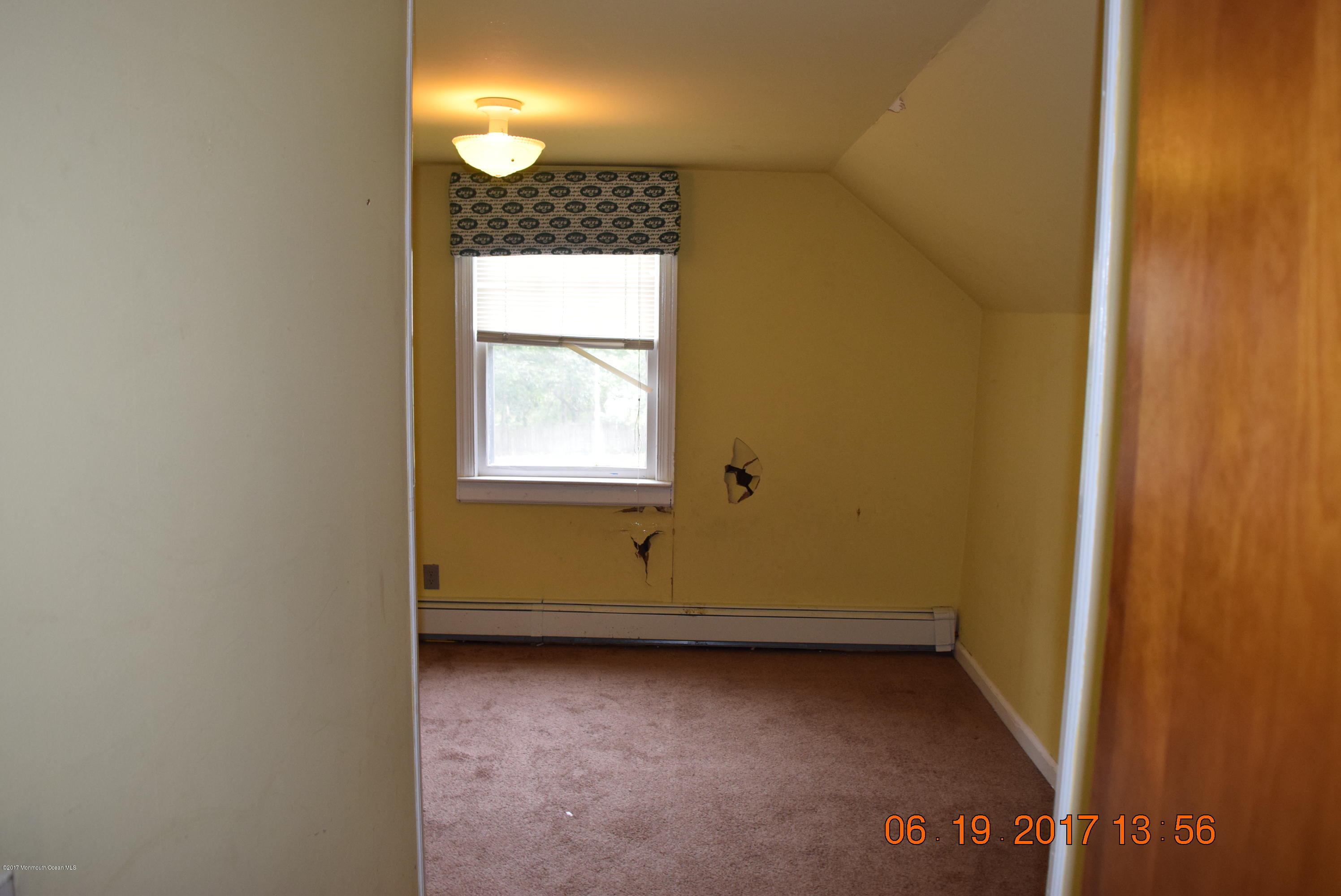 636 West Farms Road Howell, NJ 07731 - Photo 14 of 17 a view of an empty room with a window