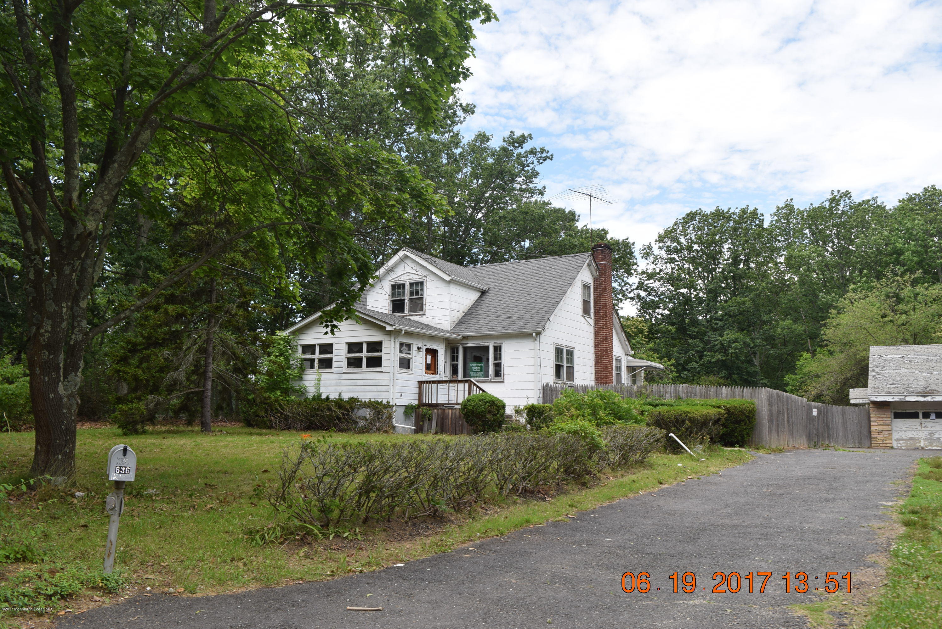 636 West Farms Road Howell, NJ 07731 - Photo 2 of 17 front view of a house with a yard
