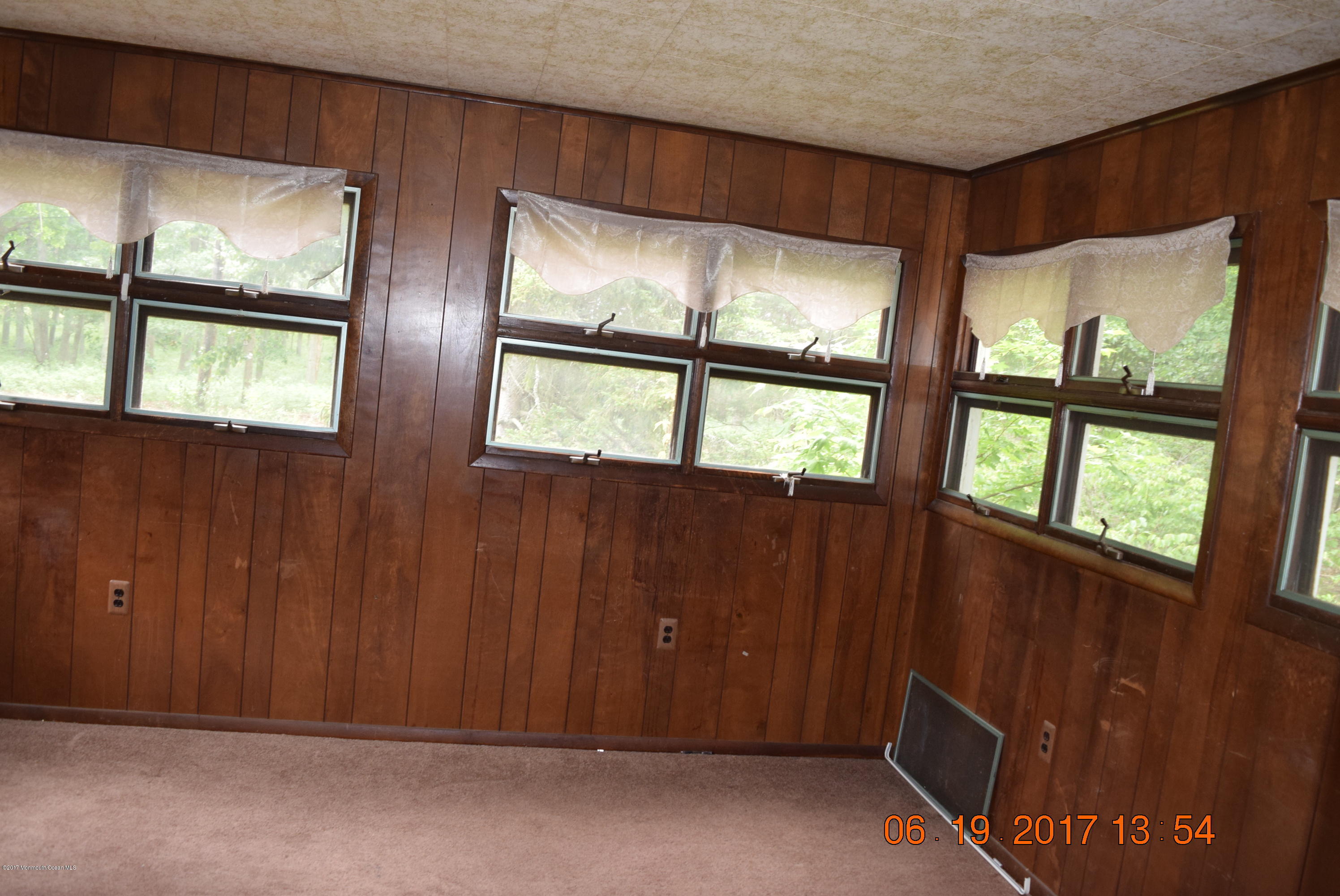636 West Farms Road Howell, NJ 07731 - Photo 3 of 17 an empty room with windows