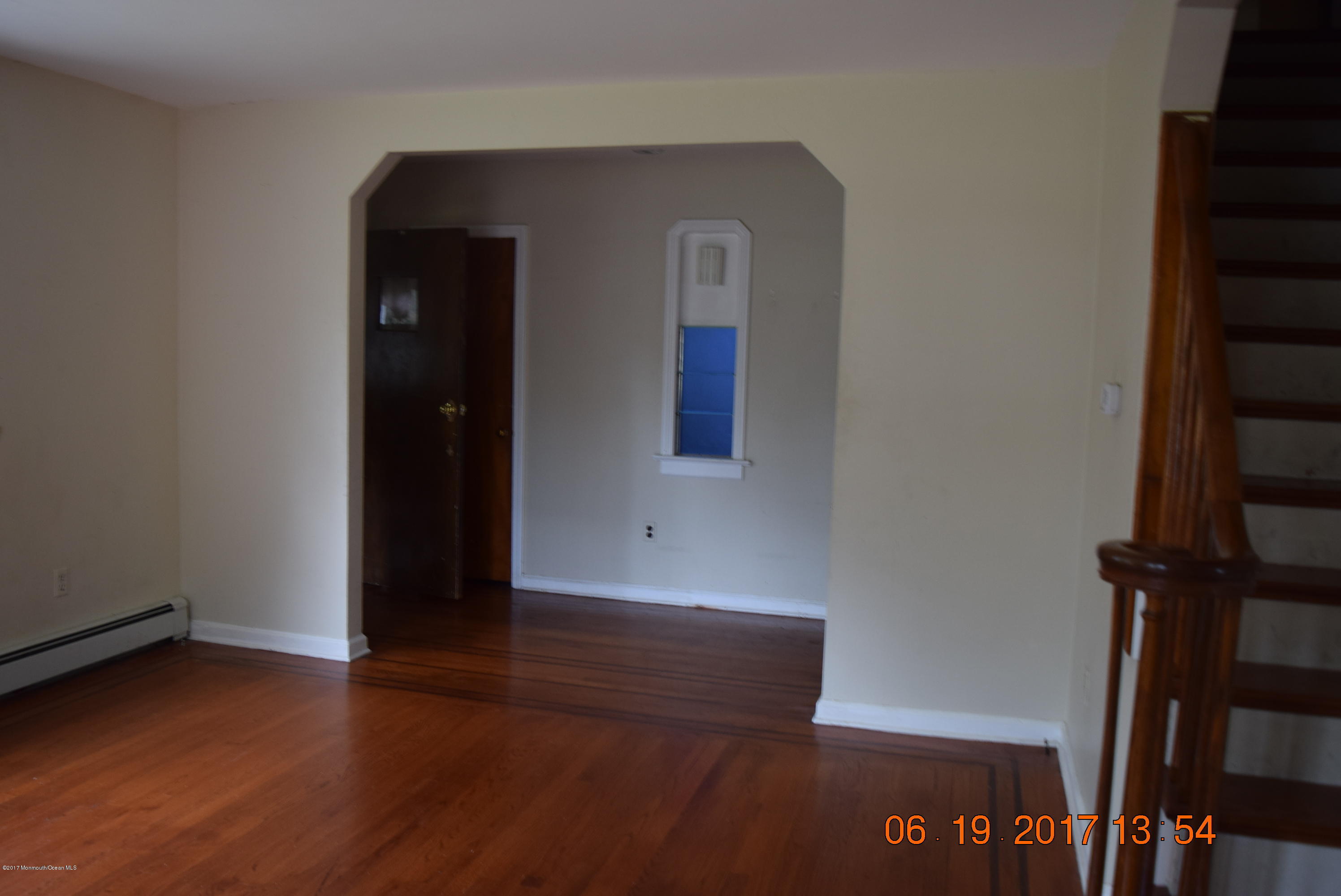 636 West Farms Road Howell, NJ 07731 - Photo 6 of 17 wooden floor in an empty room