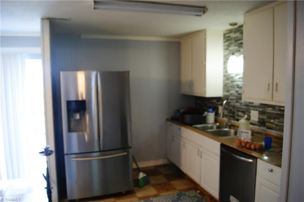 5703 Bramblegate Road Greensboro, NC 27409 - Photo 3 of 22