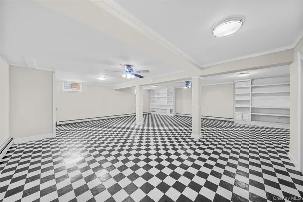 a bathroom with a sink a toilet and a shower