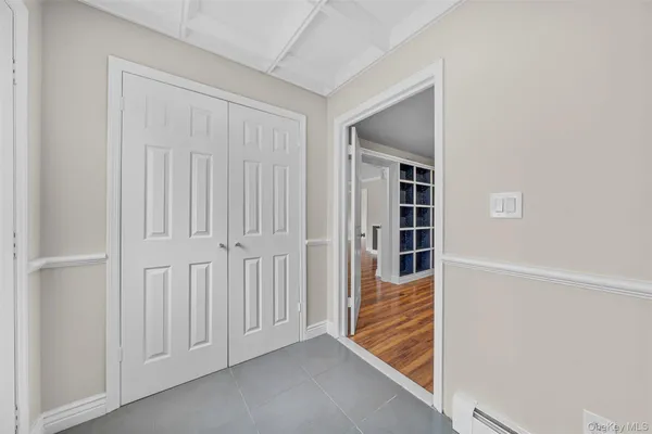 a view of a hallway with staircase