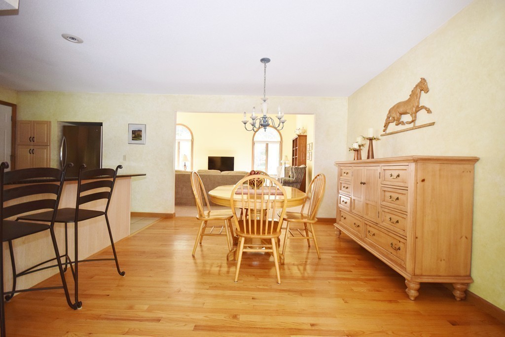 222 Somers Road Hampden, MA 01036 - Photo 13 of 30 a view of a dining room with furniture window and wooden floor