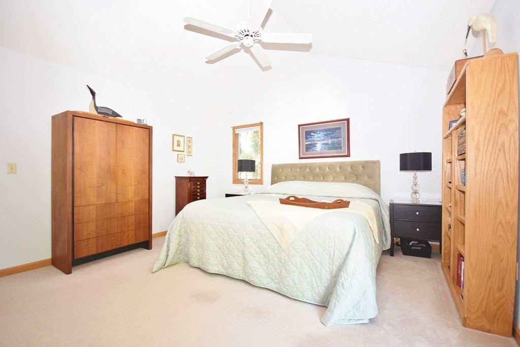222 Somers Road Hampden, MA 01036 - Photo 19 of 30 a bedroom with bed and wooden floor