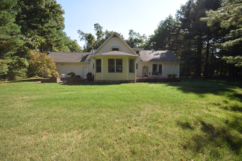 222 Somers Road Hampden, MA 01036 - Photo 2 of 30 a front view of a house with a yard