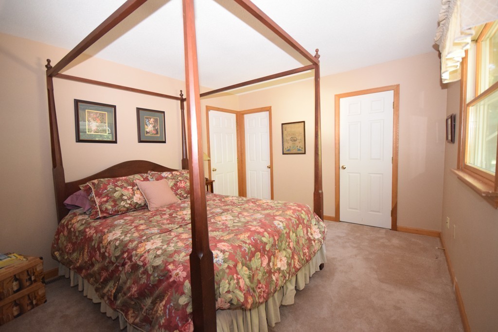 222 Somers Road Hampden, MA 01036 - Photo 23 of 30 a bedroom with a bed and a window