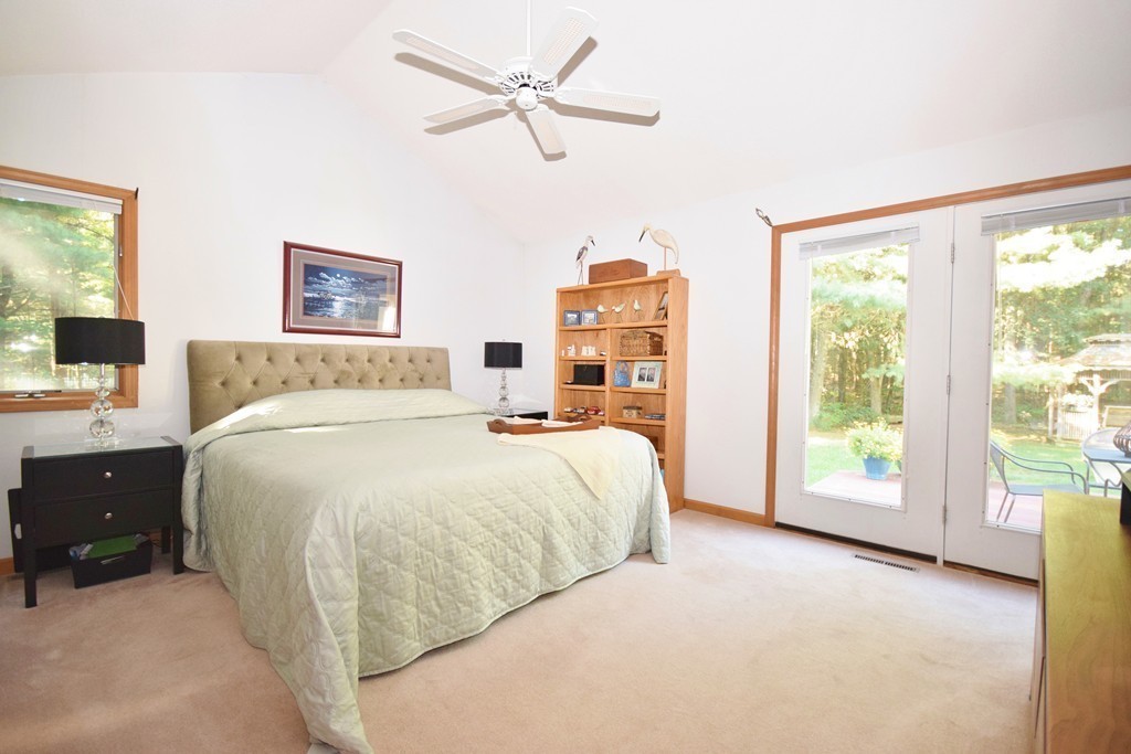222 Somers Road Hampden, MA 01036 - Photo 7 of 30 a spacious bedroom with a bed and a window