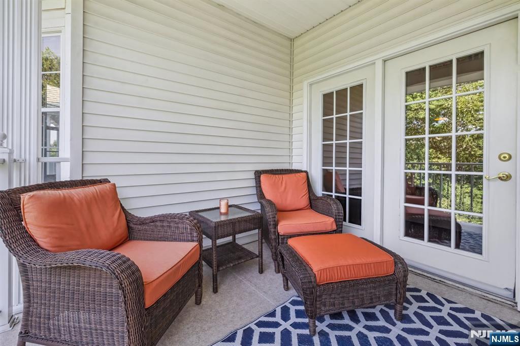 175 Rochelle Avenue, Unit 321 Rochelle Park, NJ 07662 - Photo 9 of 27 a outdoor space with a couch and a window