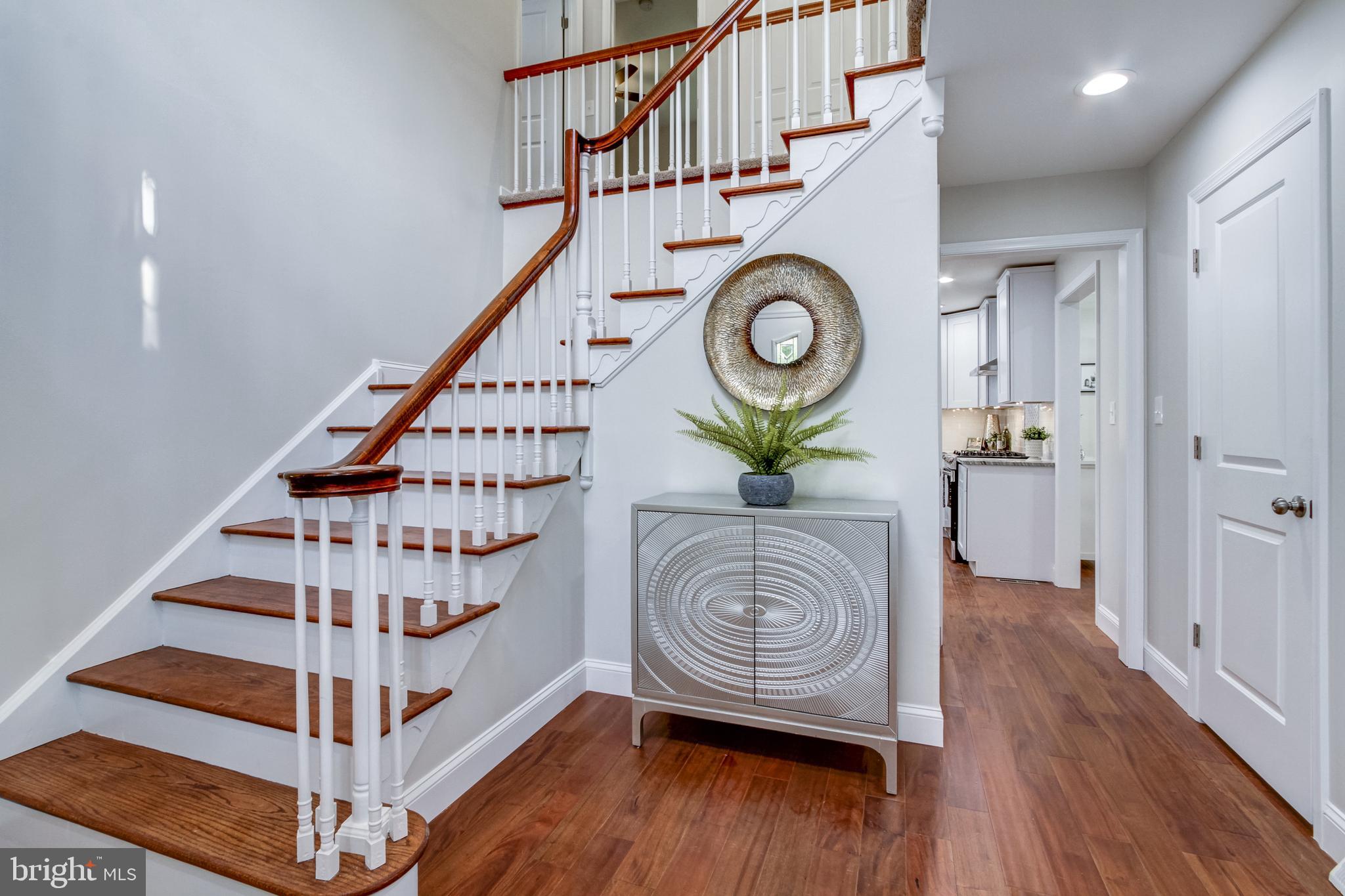 508 South Providence Road Wallingford, PA 19086 - Photo 6 of 63 Grand Staircase and Hand Scraped Hardwood Floors