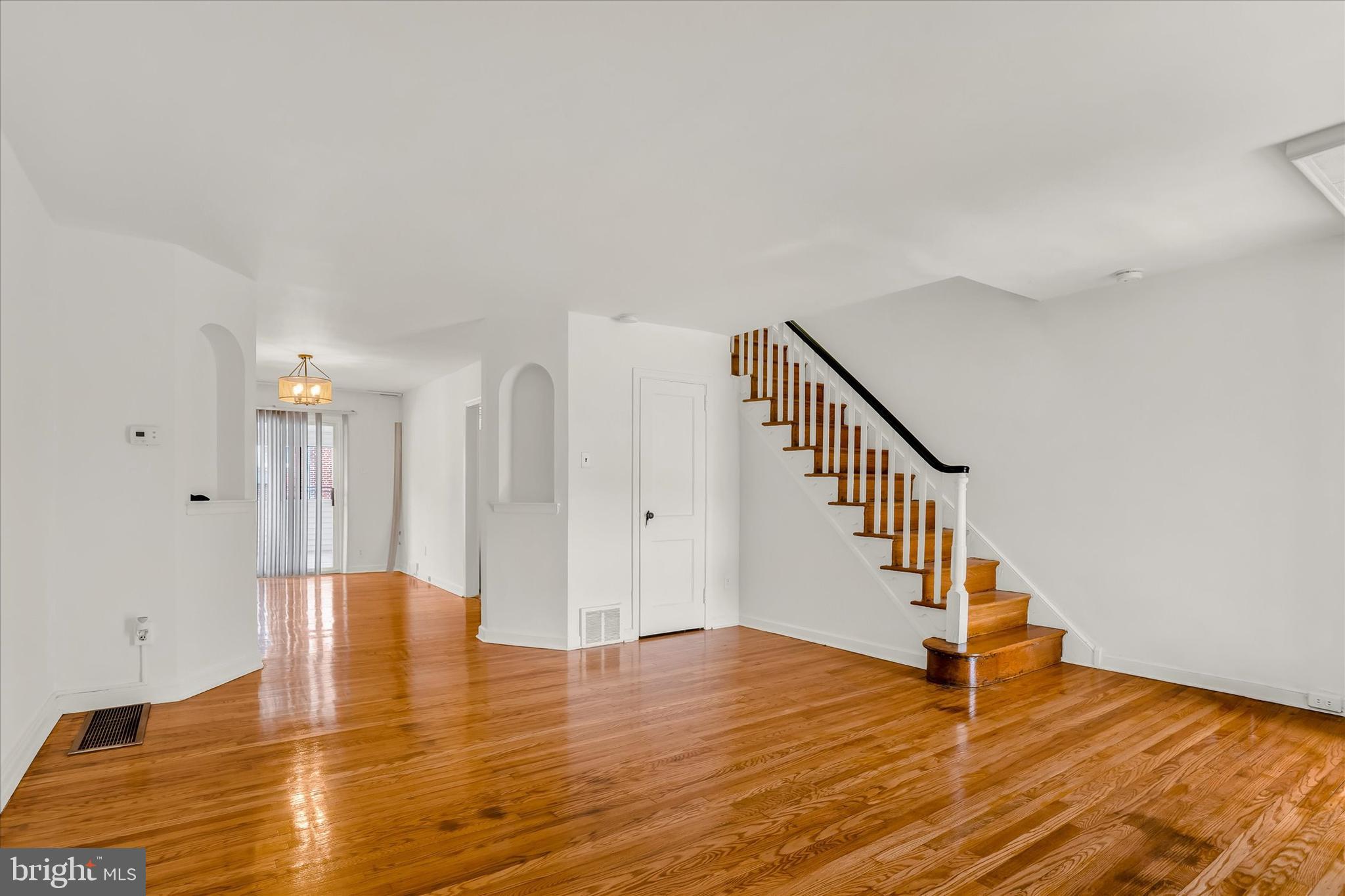 7951 Rugby Street Philadelphia, PA 19150 - Photo 3 of 24 Living Room leading to Dining Room w/built-ins