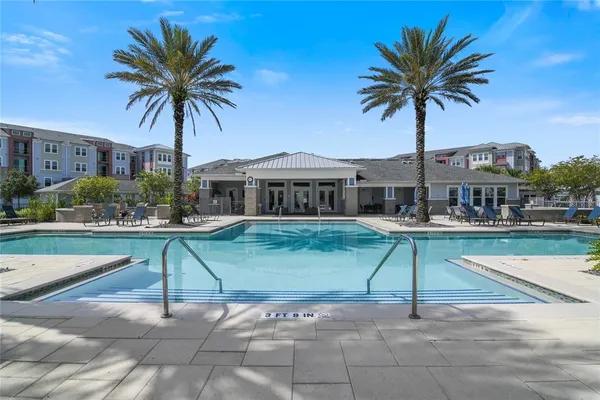 a house with palm tree in front of it