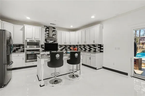 a view of a living room and bathroom