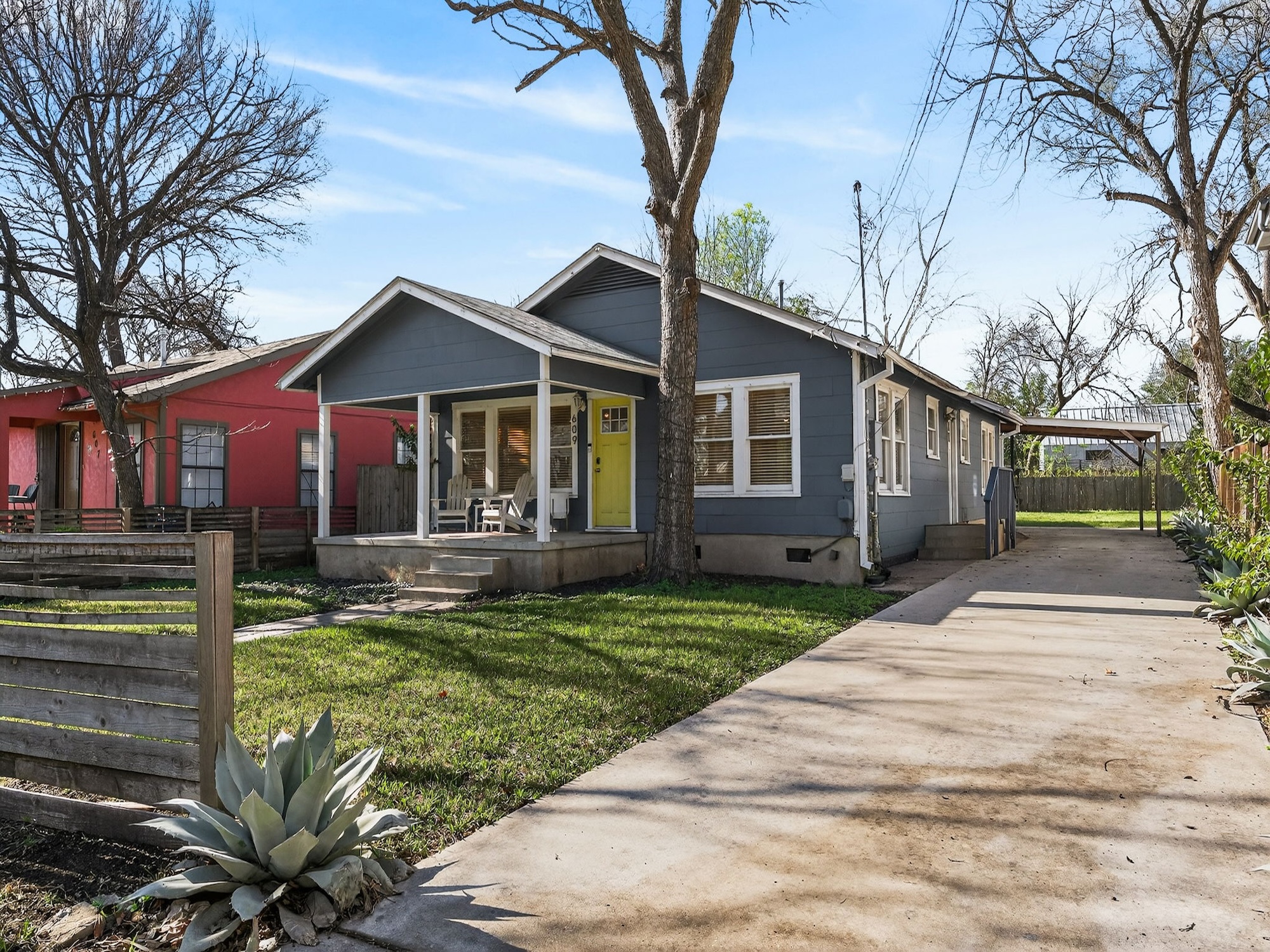 609 Fletcher Street Austin, TX 78704 - Photo 1 of 25 a front view of a house with a yard