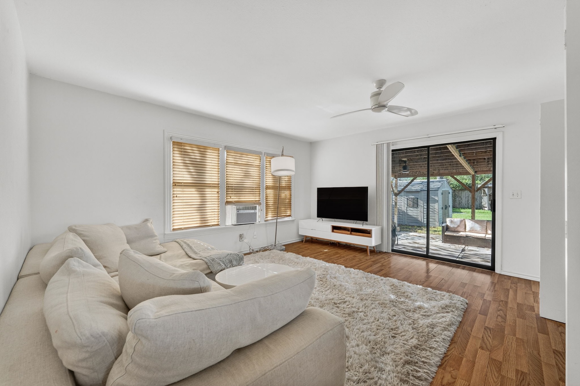 609 Fletcher Street Austin, TX 78704 - Photo 17 of 25 a living room with furniture and a flat screen tv