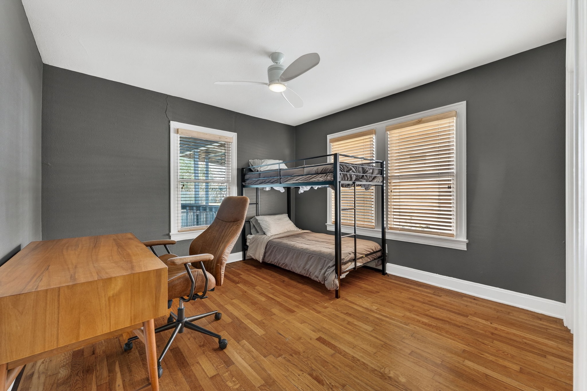 609 Fletcher Street Austin, TX 78704 - Photo 19 of 25 a bedroom with furniture and a window