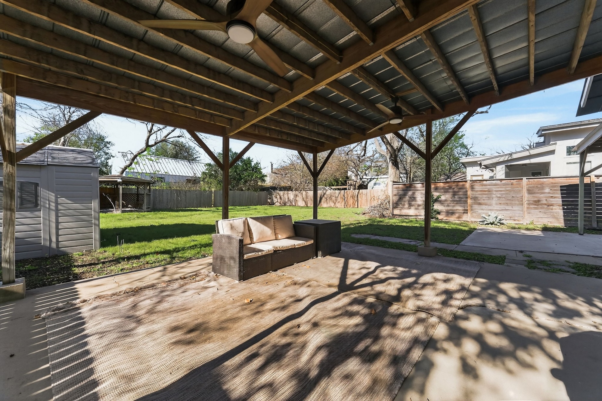 609 Fletcher Street Austin, TX 78704 - Photo 20 of 25 a view of a backyard with sitting area