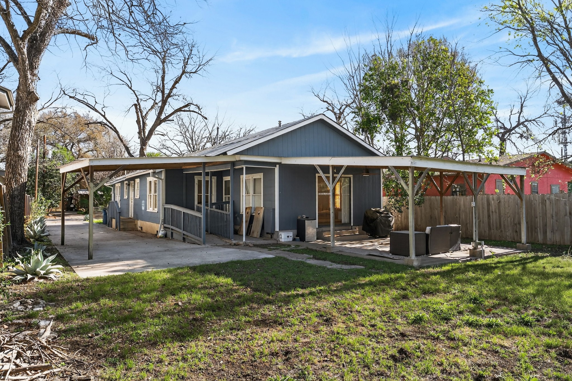 609 Fletcher Street Austin, TX 78704 - Photo 22 of 25 a front view of a house with garden and porch