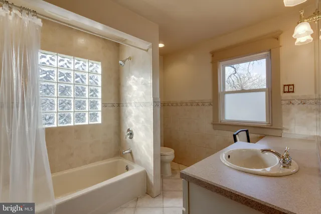 a bathroom with a sink and a bathtub