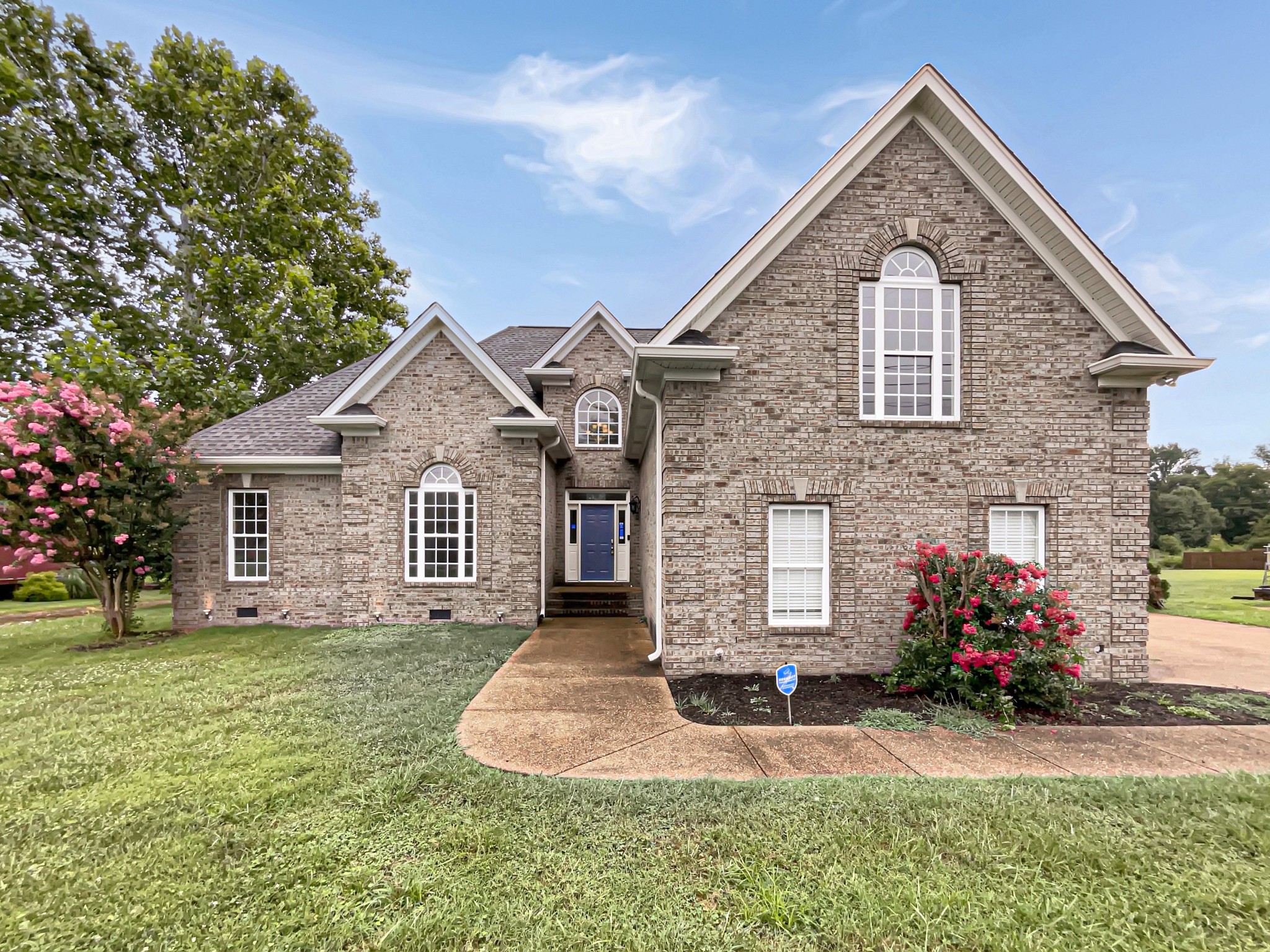 710 Heritage Road Lebanon, TN 37087 - Photo 1 of 23 a front view of a house with a yard and garage