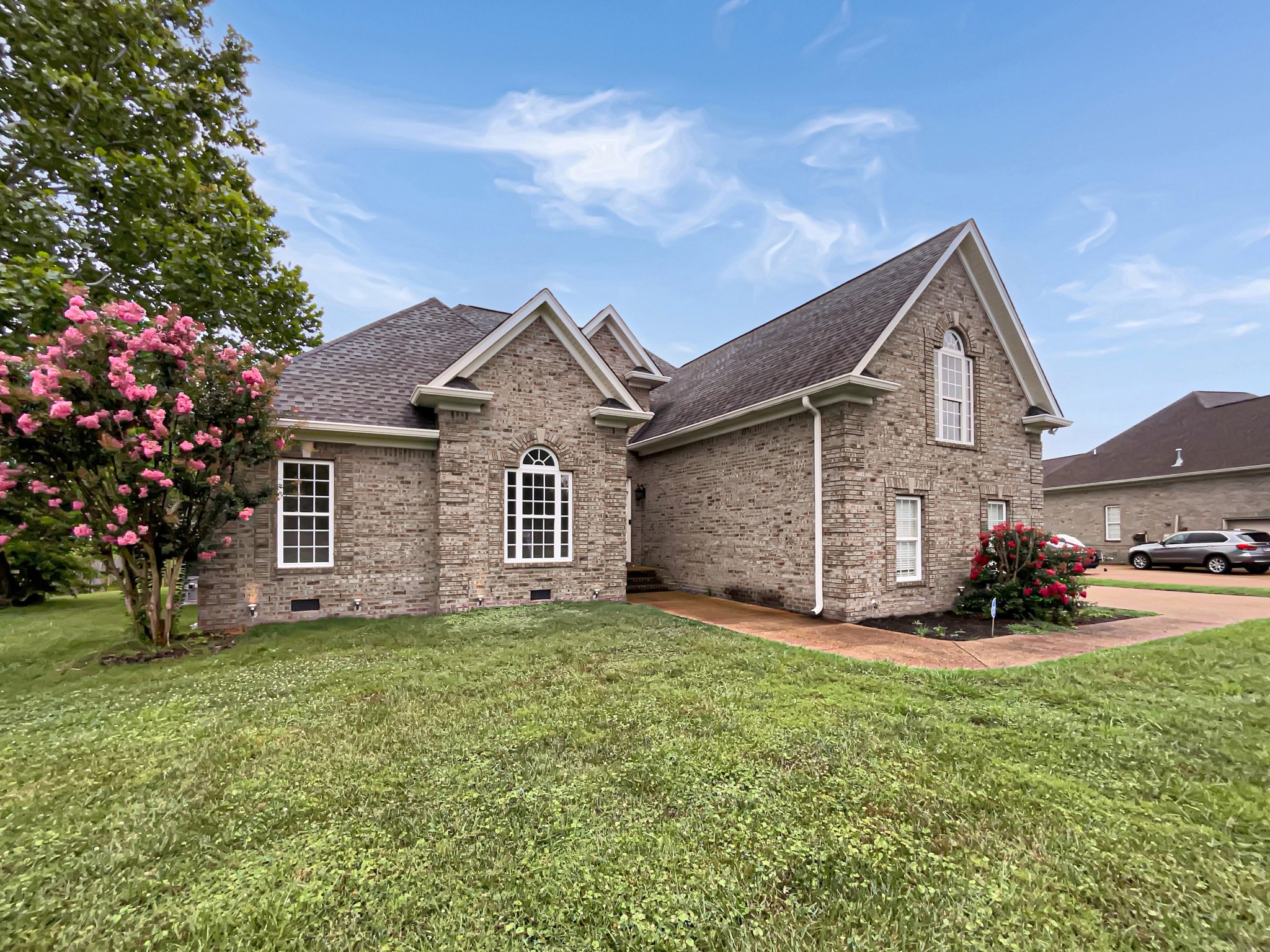 710 Heritage Road Lebanon, TN 37087 - Photo 9 of 23 a front view of a house with a yard and garage