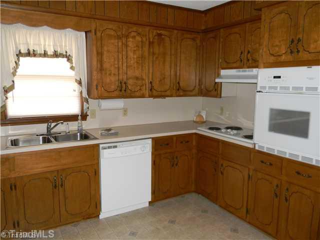 123 Aaron Road Elkin, NC 28621 - Photo 3 of 11 Kitchen. Lots of cabinet space in the kitchen.