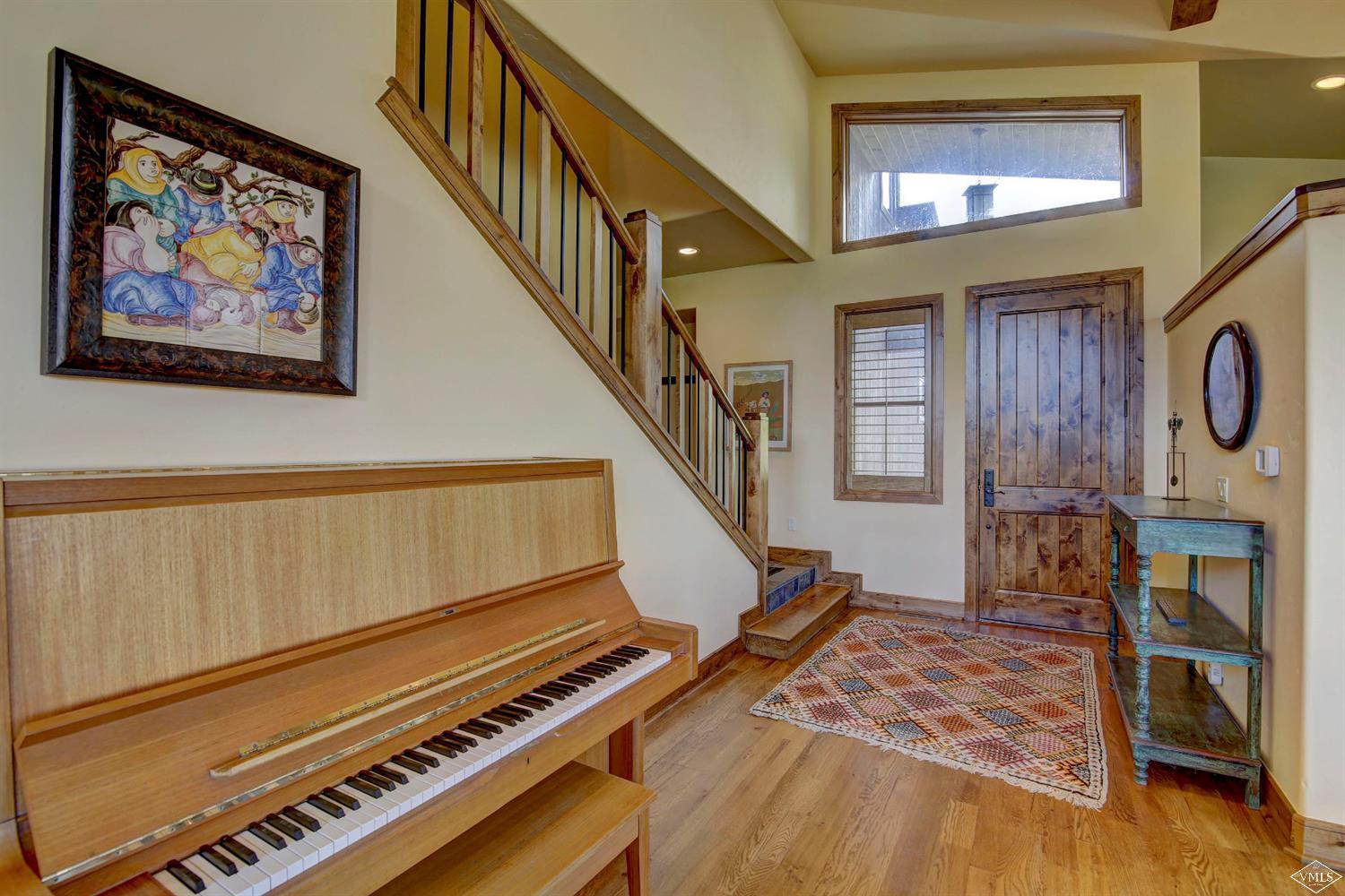 46 Hollis Lane Edwards, CO 81632 - Photo 13 of 25 a living room with furniture and a piano