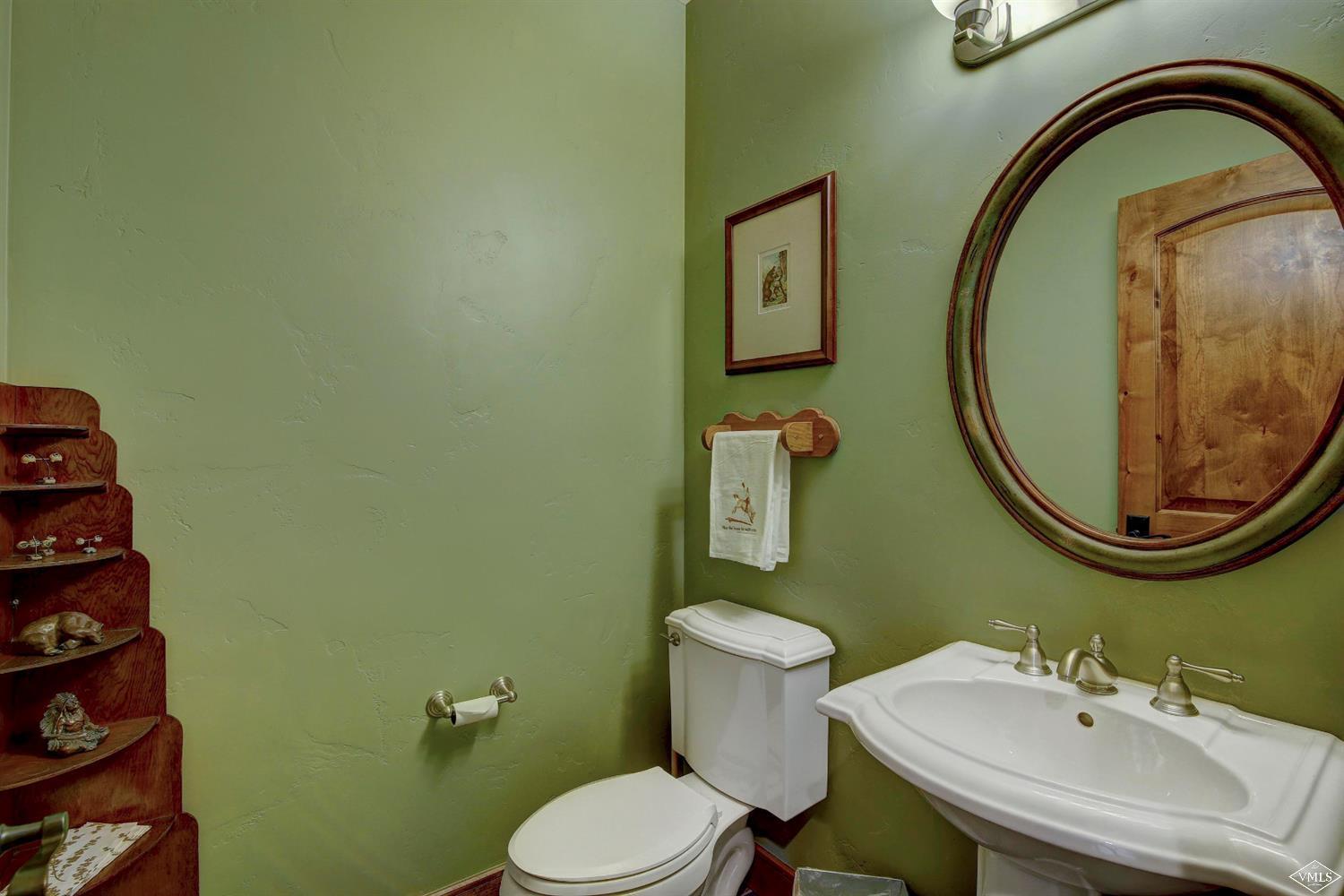 46 Hollis Lane Edwards, CO 81632 - Photo 16 of 25 a bathroom with a toilet a sink and mirror