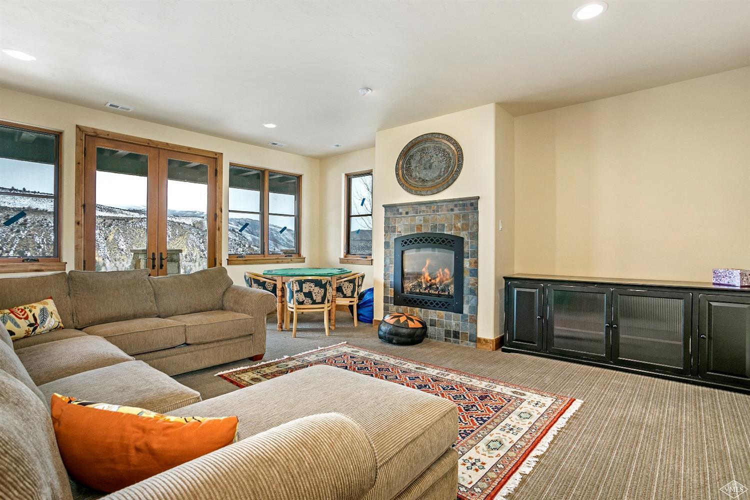 46 Hollis Lane Edwards, CO 81632 - Photo 23 of 25 a living room with furniture and a fireplace