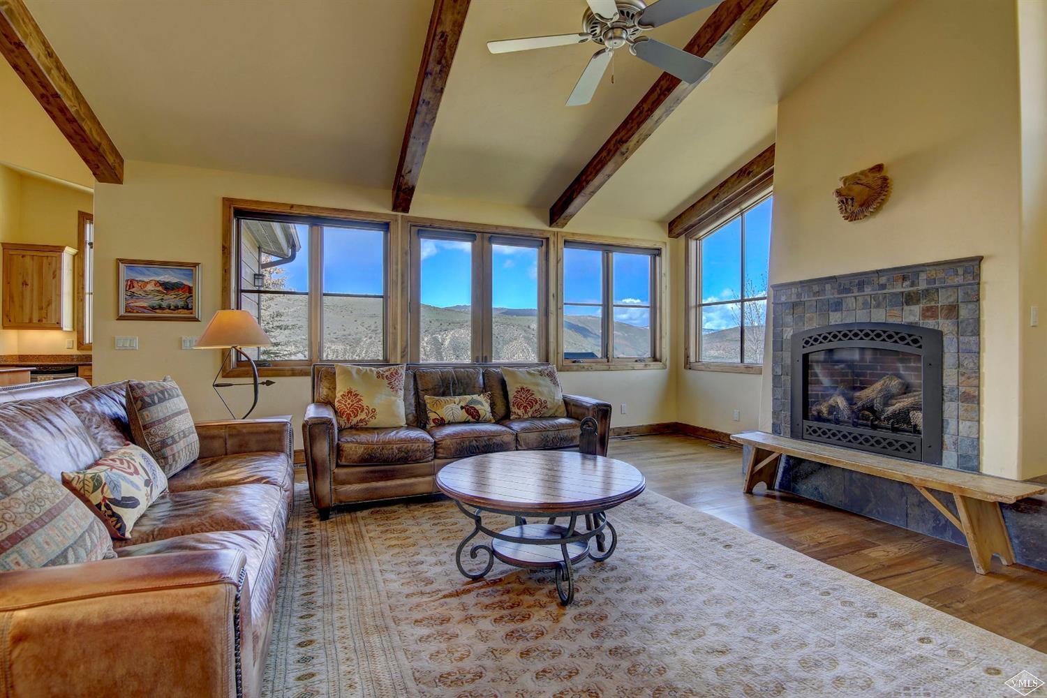 46 Hollis Lane Edwards, CO 81632 - Photo 7 of 25 a living room with furniture and a fireplace