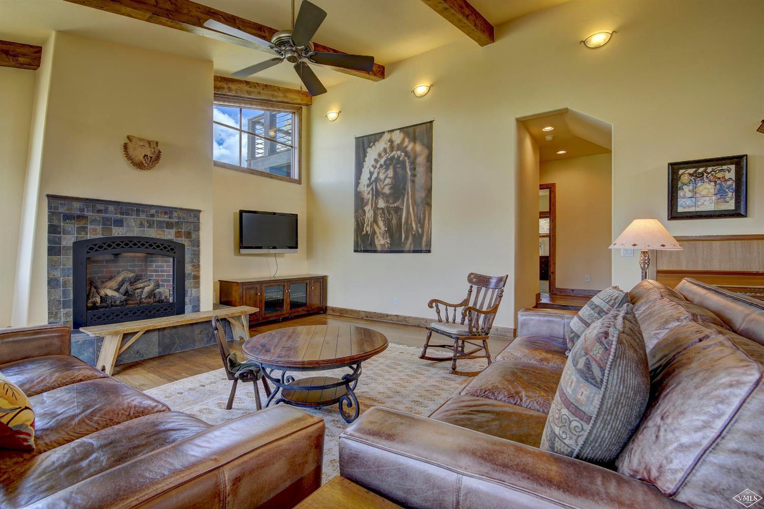 46 Hollis Lane Edwards, CO 81632 - Photo 8 of 25 a living room with furniture and a fireplace
