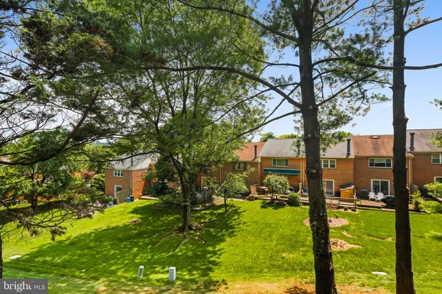 a view of a building with a yard