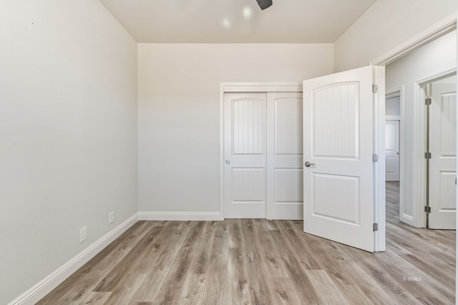 1031 West Church Avenue Ridgecrest, CA 93555 - Photo 39 of 49 a view of a room with wooden floor
