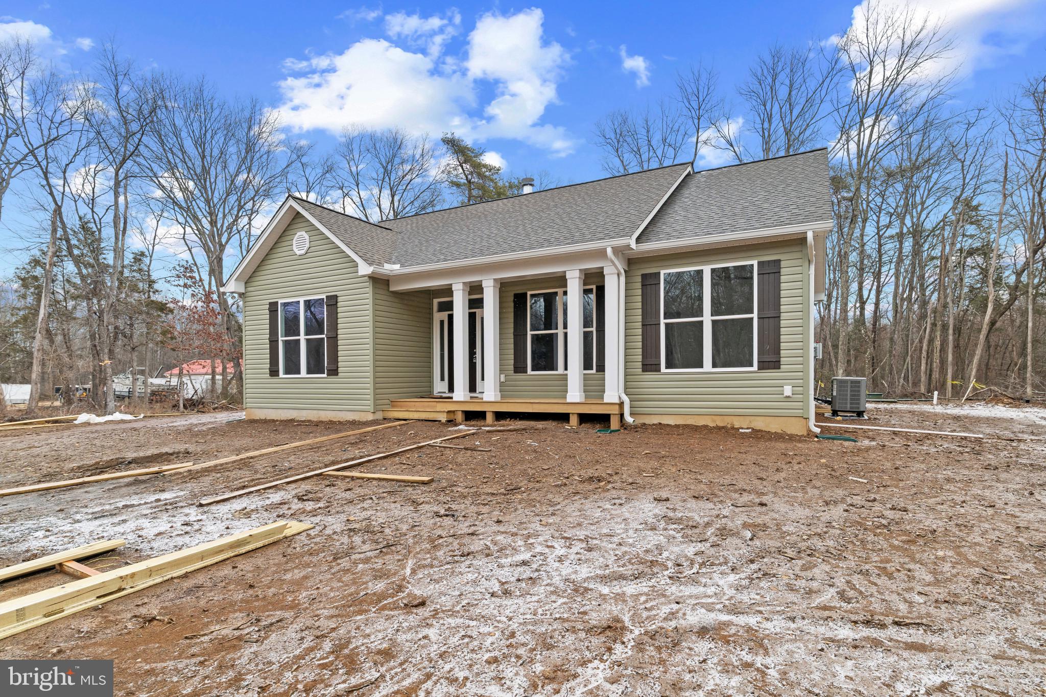 6735 Beverly Road Broad Run, VA 20137 - Photo 3 of 30 Ranch-style house with a shingled roof and a porch