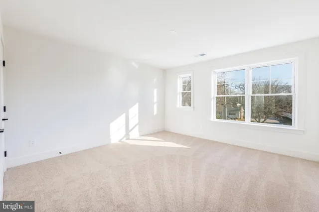 a kitchen with stainless steel appliances granite countertop a stove and a microwave