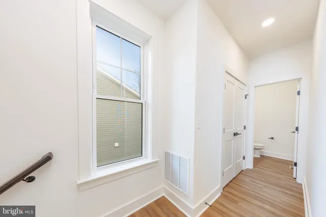 a bathroom with a bathtub and toilet