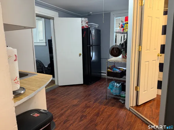 a bedroom with a bed and a closet