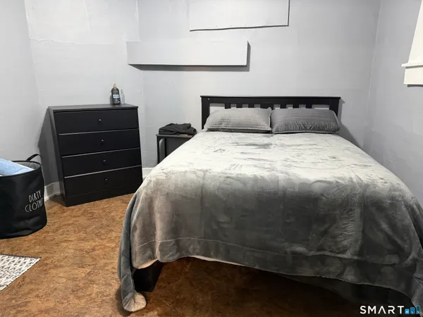 a bathroom with a toilet and a sink