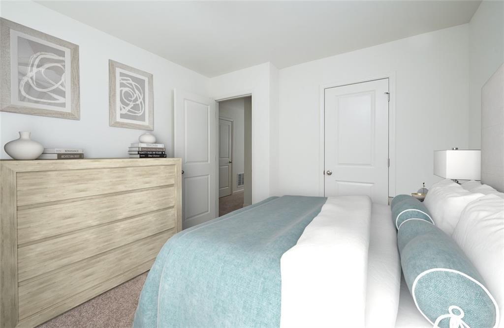 228 Gillis Way Villa Rica, GA 30180 - Photo 5 of 8 a bedroom with a bed and cabinet