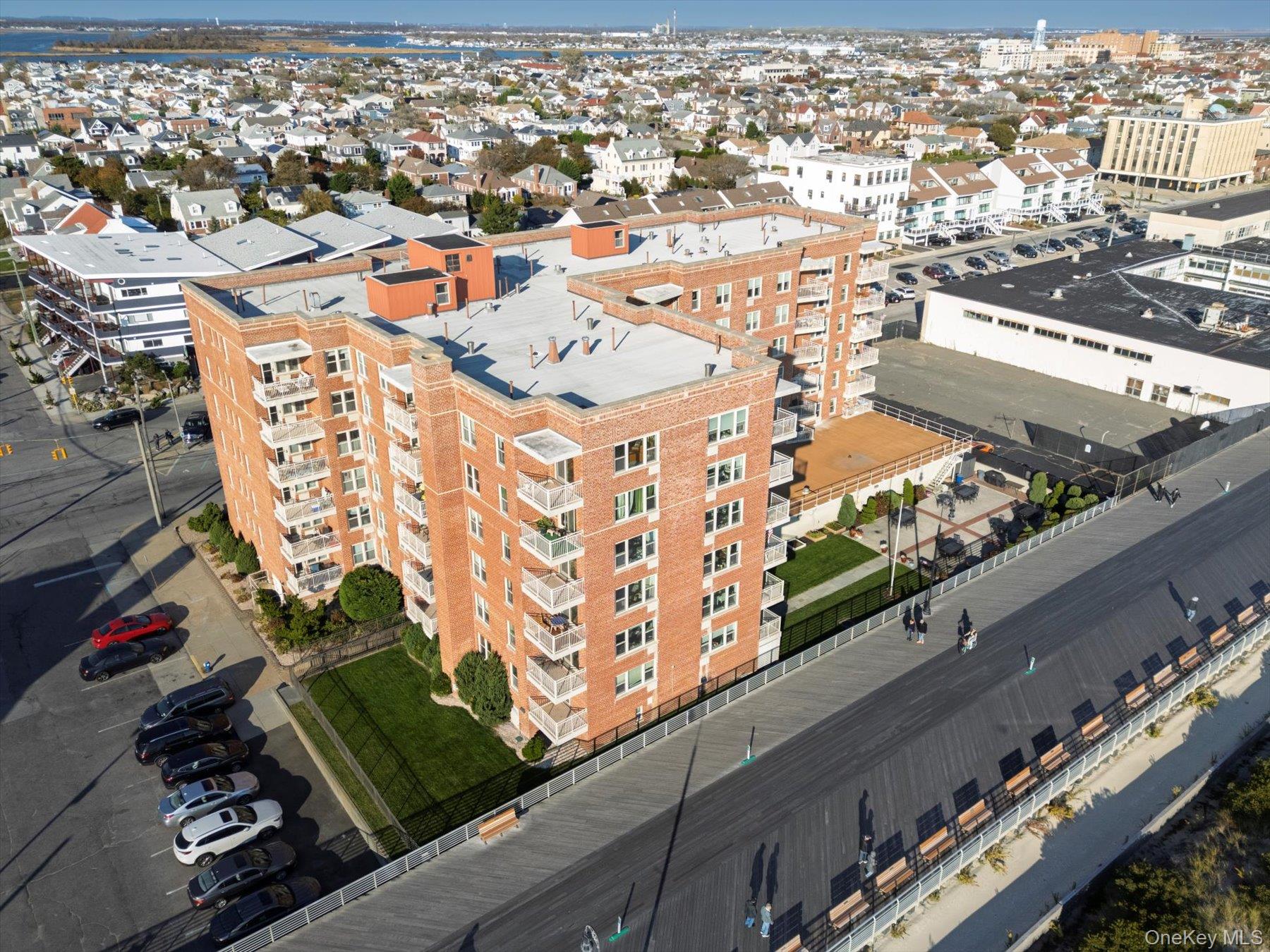 560 West Broadway, Unit 4R Long Beach, NY 11561 - Photo 20 of 26 an aerial view of residential building and street